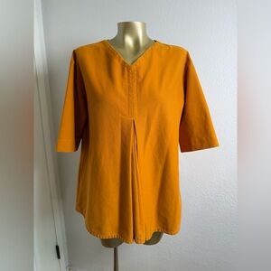 COS pleated blouse in a burnt orange or yellow color S